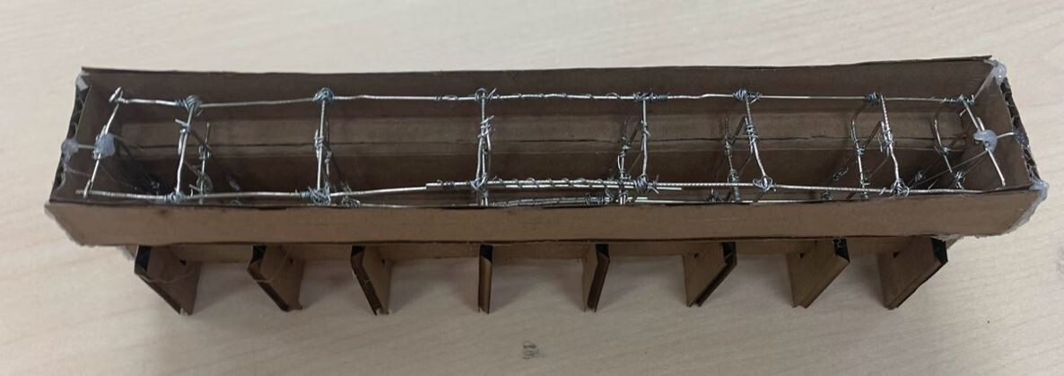 Cardboard formwork for the T-beam with the reinforcement cage inside